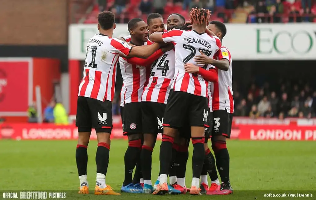 Brentford players celebrate a goal against Sheffield Wednesday